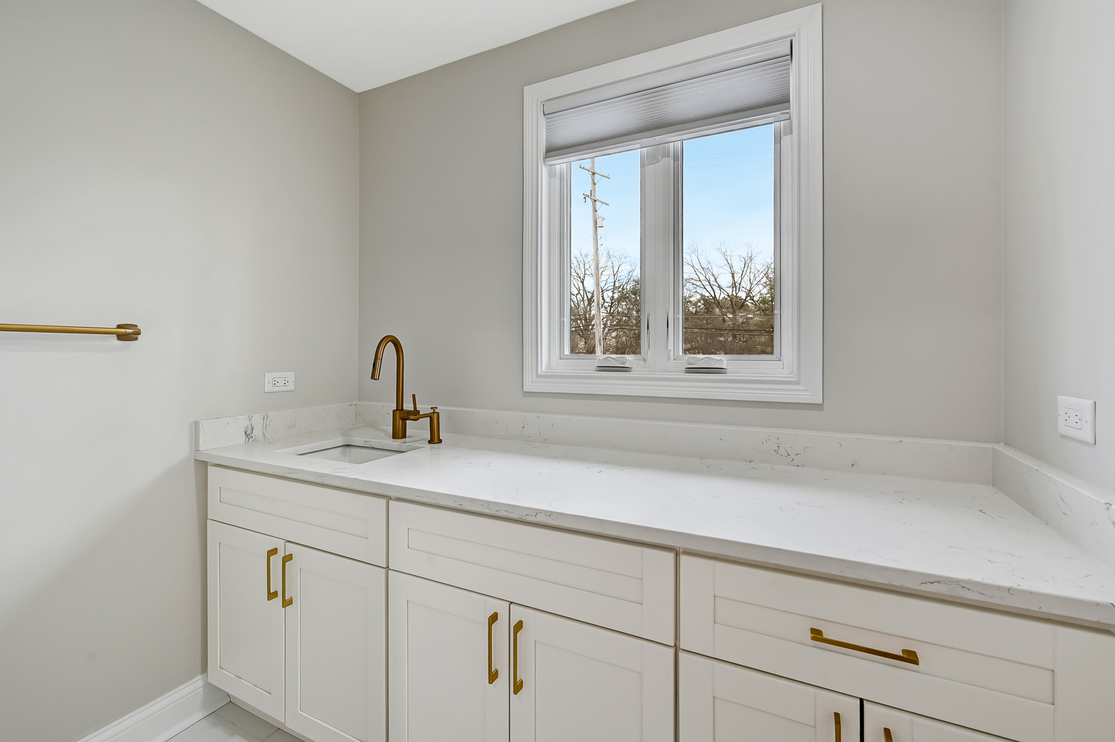 3220 Meyers Road Oak Brook, IL 60523 - Photo 31 of 43 a bathroom with a sink and a window