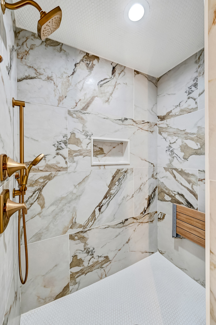 3220 Meyers Road Oak Brook, IL 60523 - Photo 35 of 43 a bathroom with a bathtub and shower