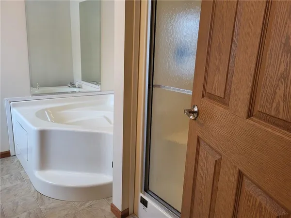 a bathroom with a toilet and a sink
