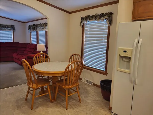 a view of a dining room with furniture