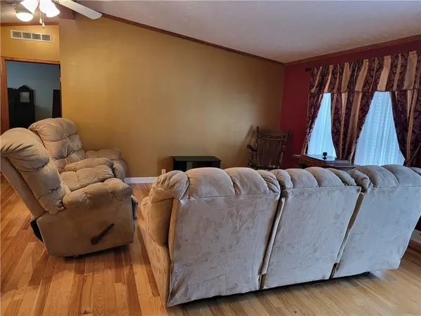 a bed room with a bed and a couch