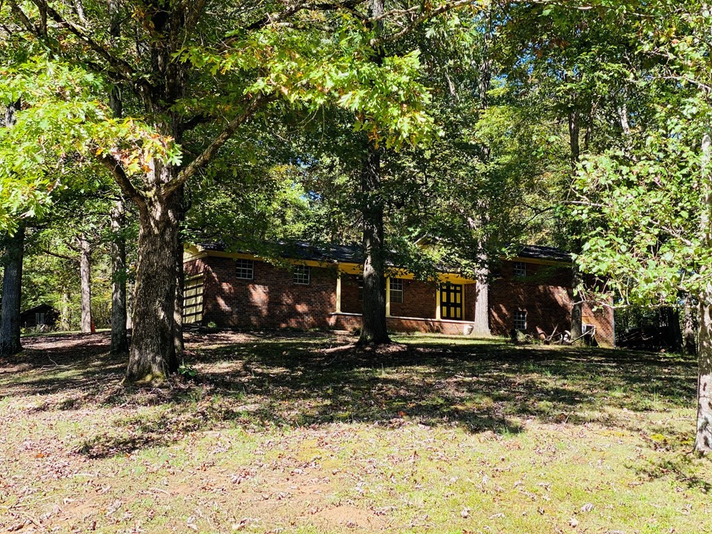 8693 Eureka Road Northwest Charleston, TN 37310 - Photo 3 of 35 a view of a house with a yard