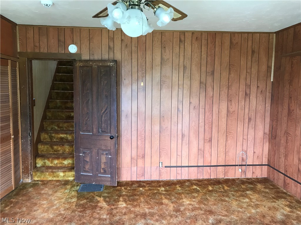 4163 Paradise Road Medina, OH 44256 - Photo 14 of 34 North side of the dining room with stairs to the 2nd floor.