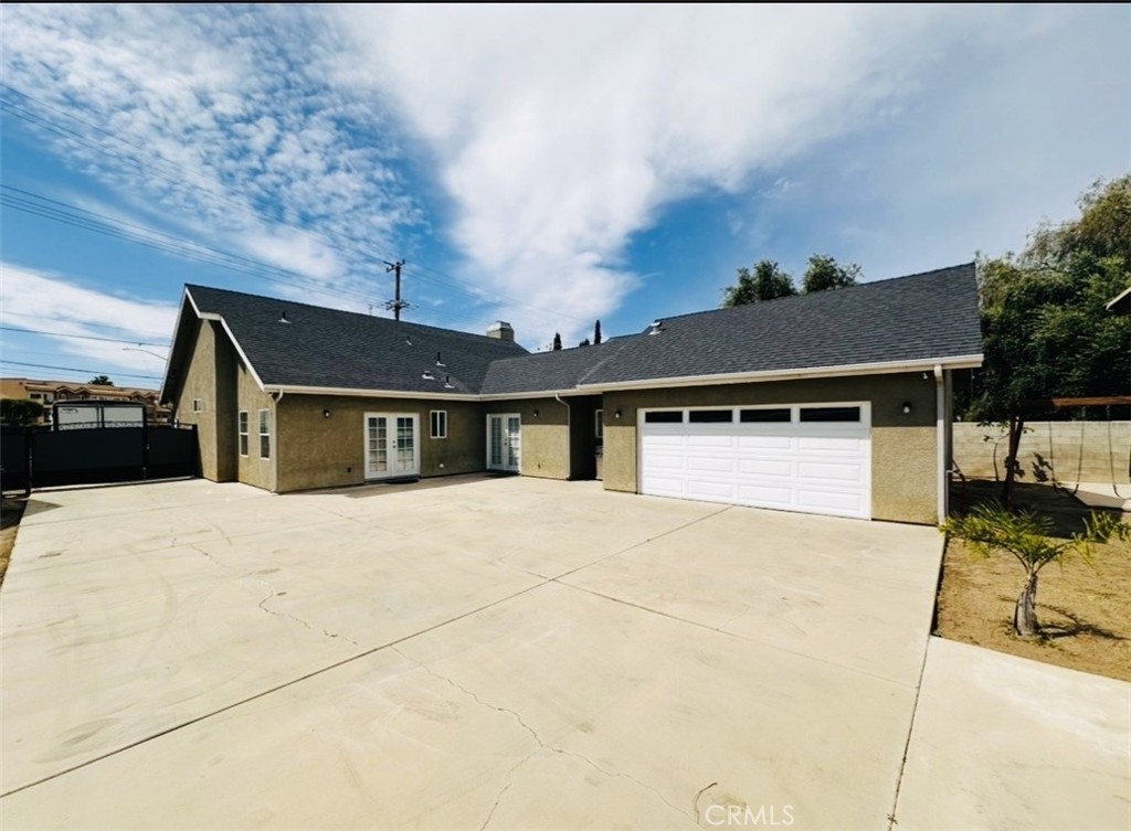 514 West Randall Avenue Rialto, CA 92376 - Photo 15 of 19 a front view of house with yard