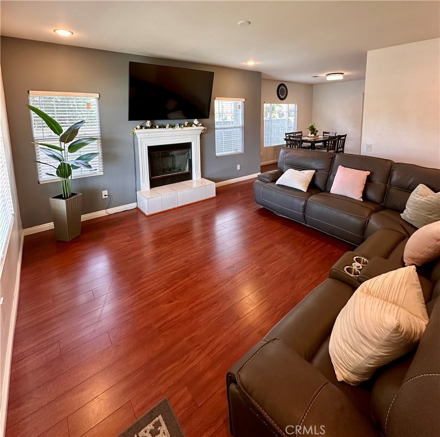 514 West Randall Avenue Rialto, CA 92376 - Photo 3 of 19 a living room with furniture fireplace and flat screen tv