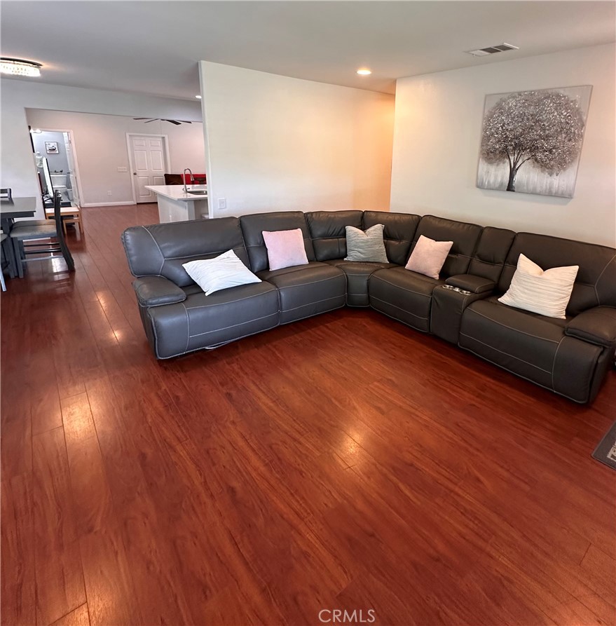 514 West Randall Avenue Rialto, CA 92376 - Photo 4 of 19 a living room with furniture and wooden floor