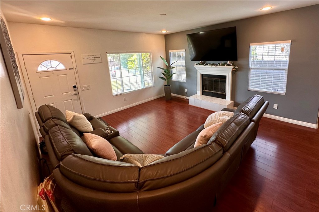 514 West Randall Avenue Rialto, CA 92376 - Photo 5 of 19 a living room with furniture fireplace and flat screen tv