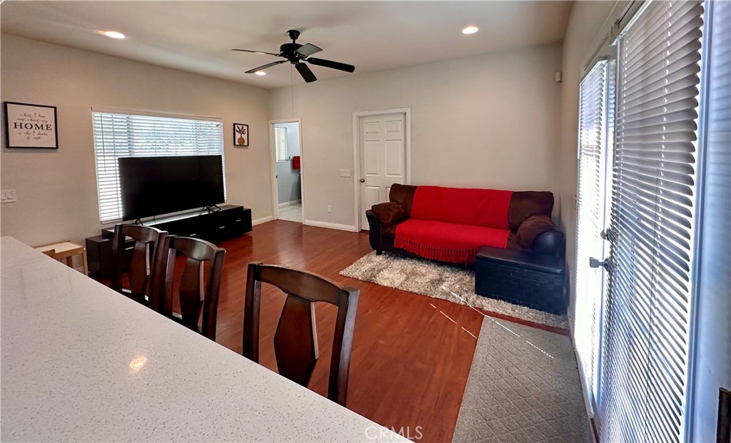 514 West Randall Avenue Rialto, CA 92376 - Photo 10 of 19 a living room with furniture and a flat screen tv