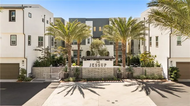 a kitchen with a sink stove and refrigerator