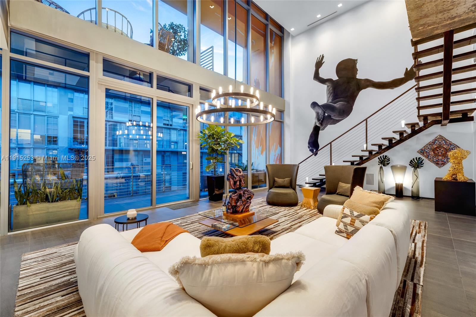 250 Northwest 24th Street, Unit PHA Miami, FL 33127 - Photo 3 of 68 a outdoor living space with furniture