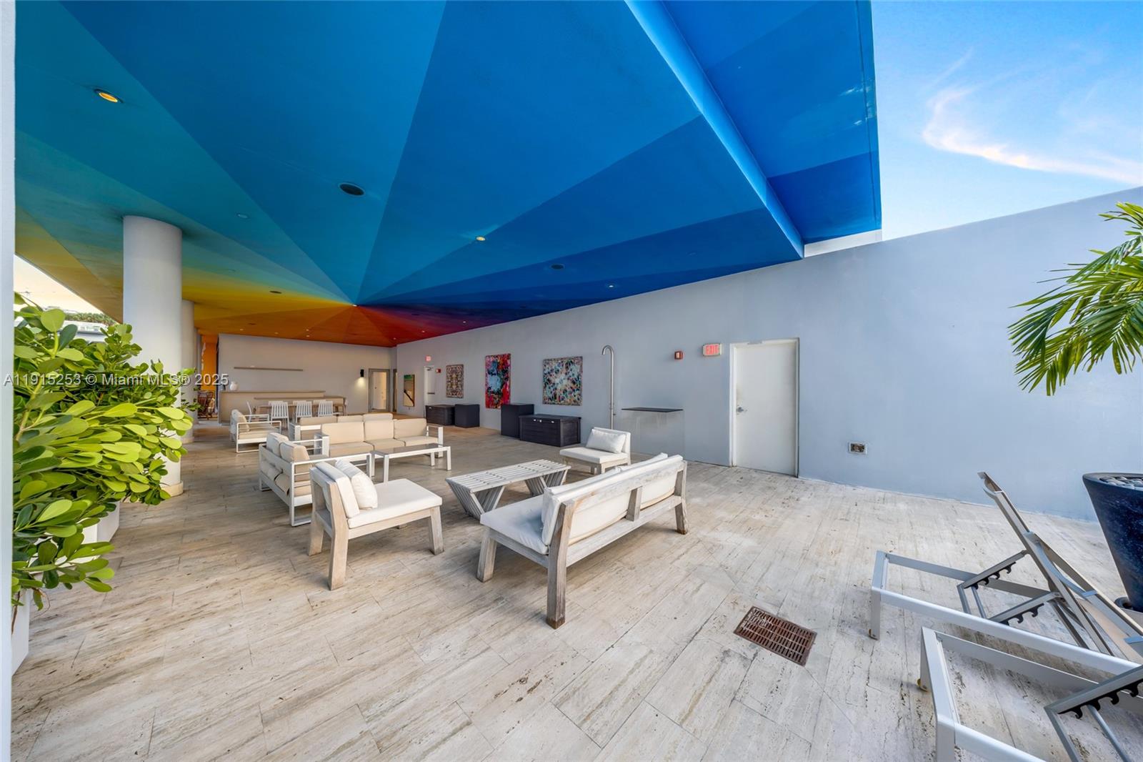 250 Northwest 24th Street, Unit PHA Miami, FL 33127 - Photo 49 of 68 a living room with furniture and a wooden floor