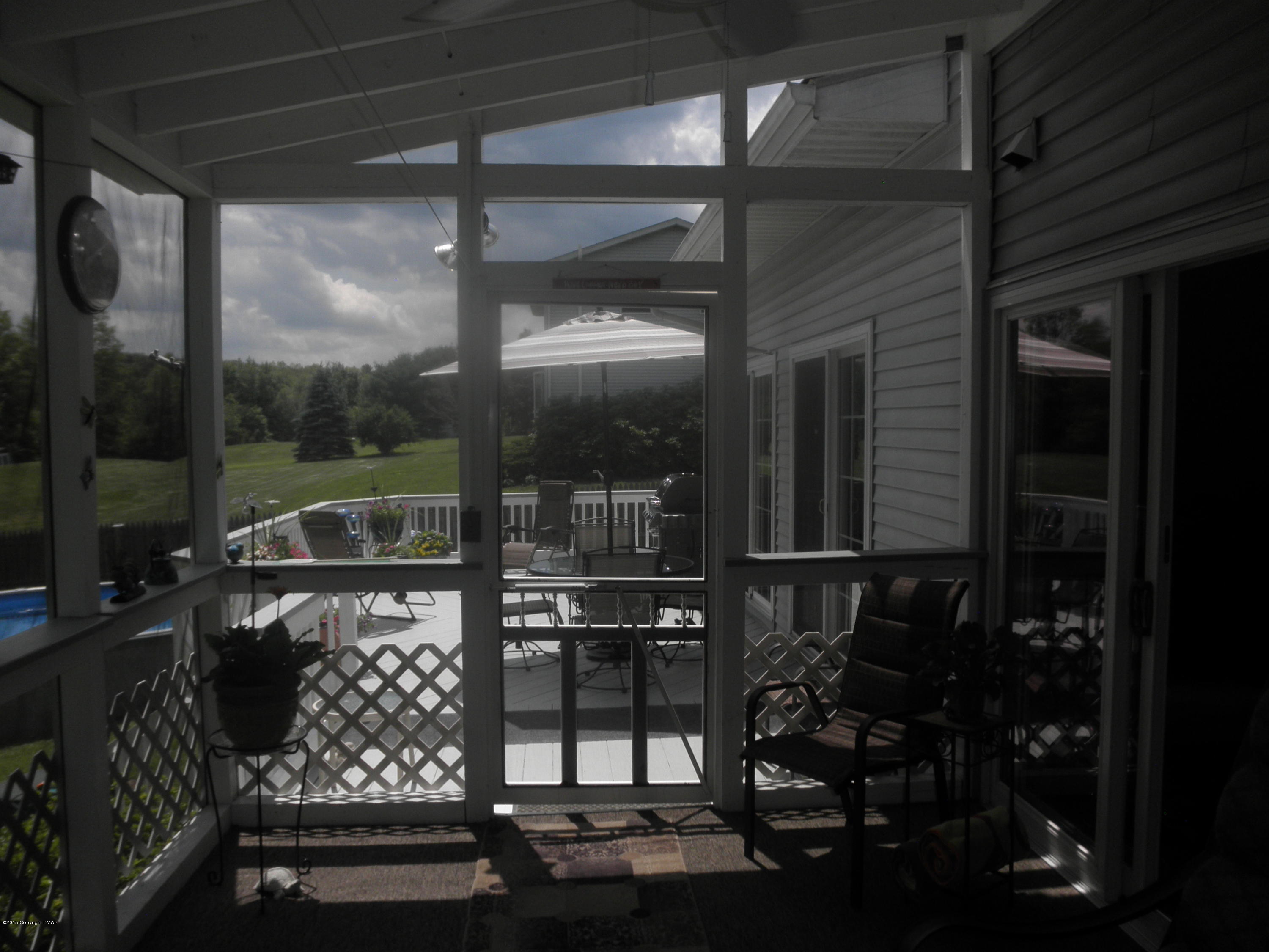 1222 Spring Run Road Saylorsburg, PA 18353 - Photo 16 of 55 Porch adjoins rear deck