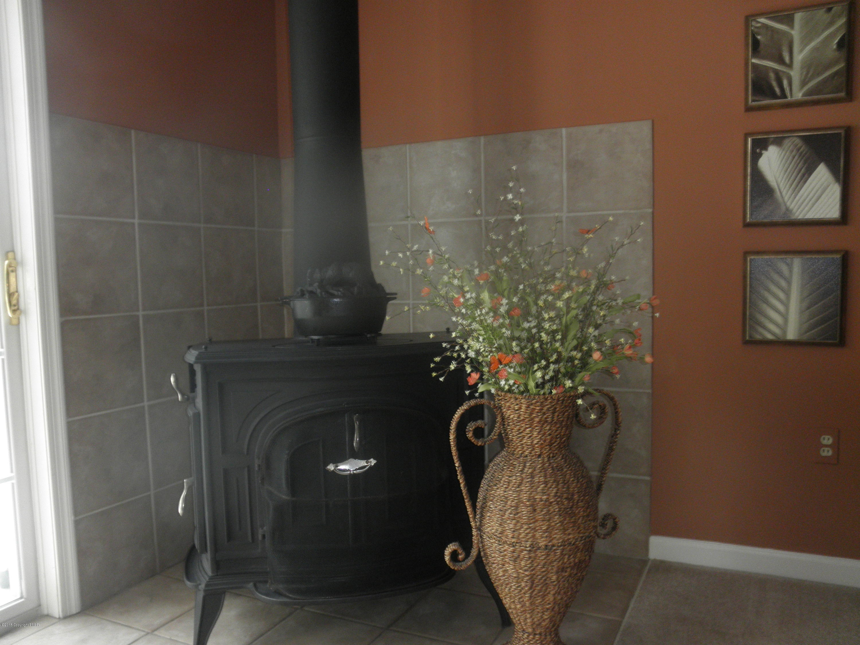 1222 Spring Run Road Saylorsburg, PA 18353 - Photo 18 of 55 Tile backed wood stove