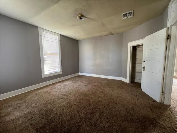 a view of a house with a wooden door