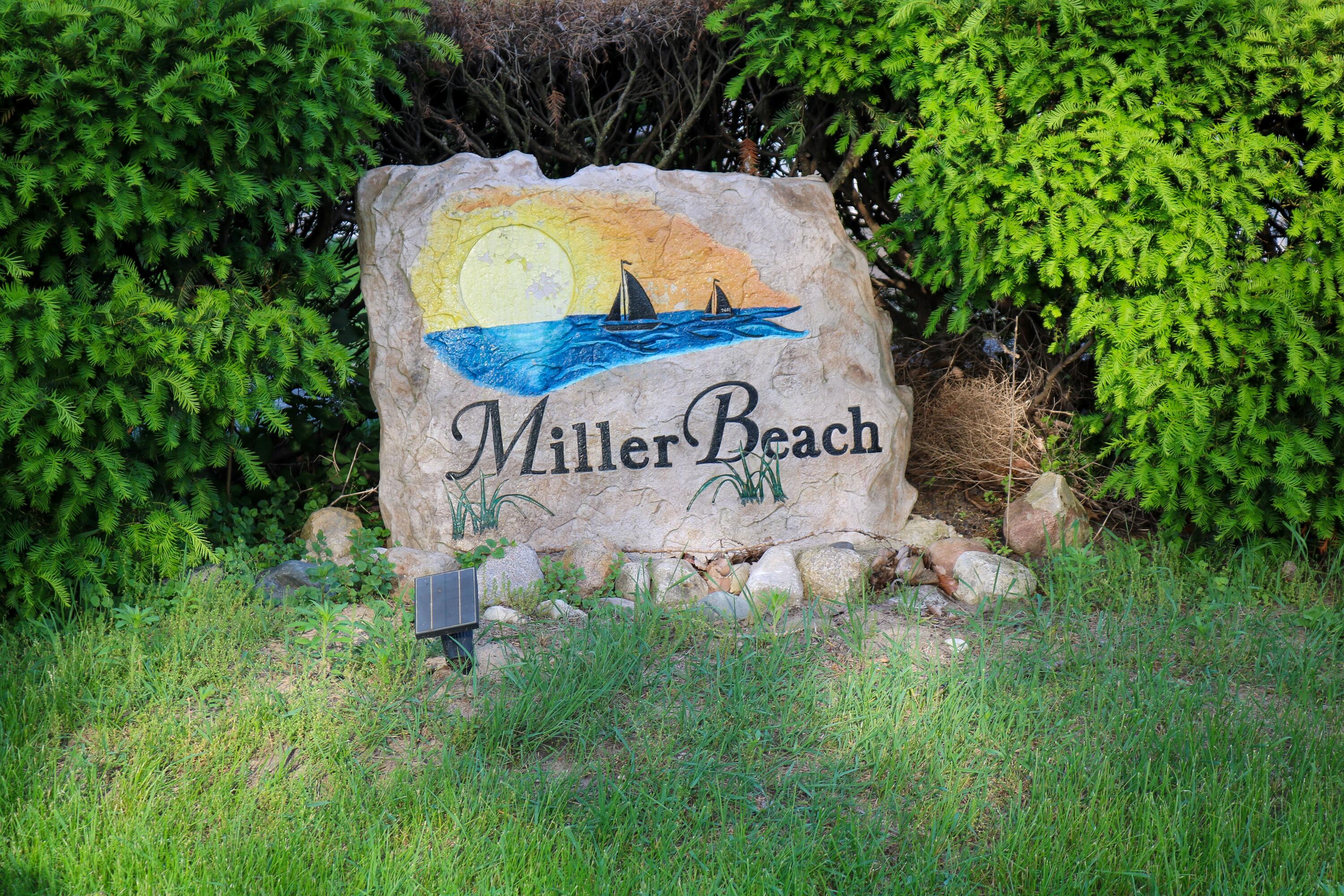 1200-02 North County Line Road Gary, IN 46403 - Photo 34 of 37 a sign of golf club on a wall under a tree