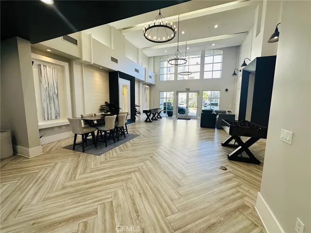 a view of a livingroom with furniture and a window