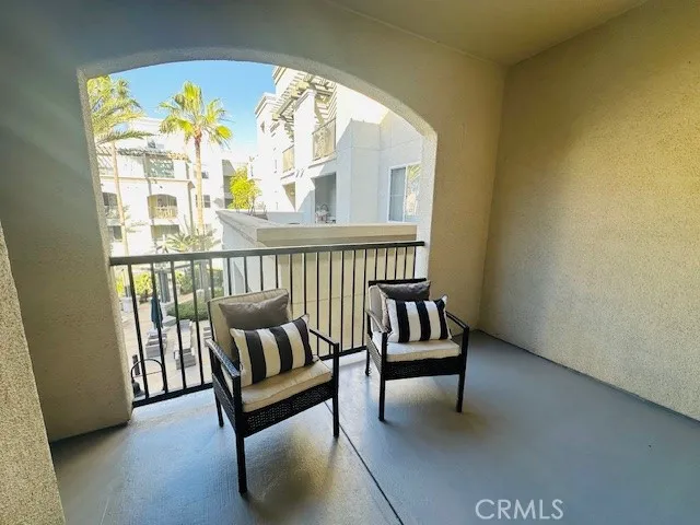 a view of a two chair in the balcony