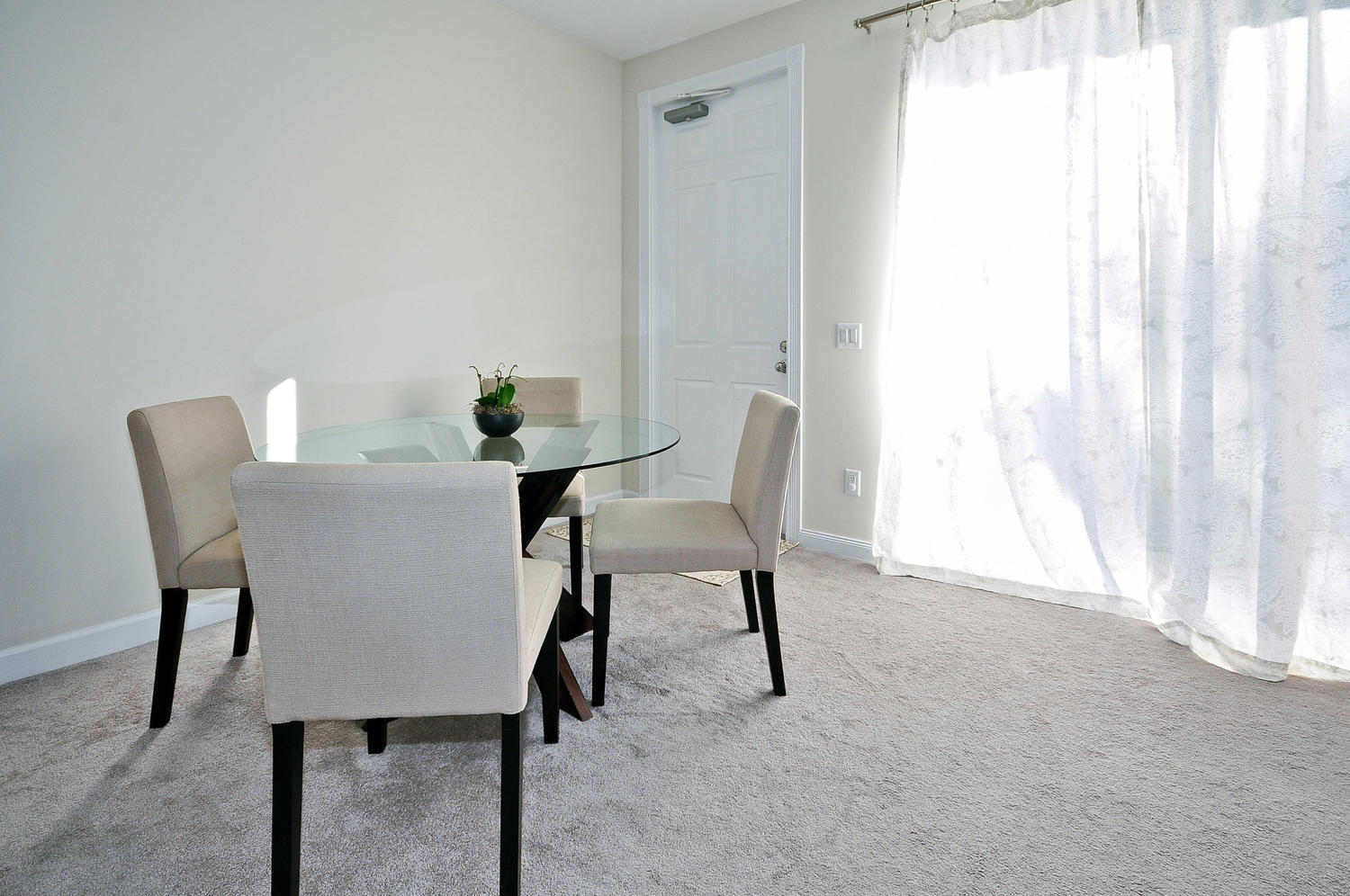4135 Community Drive Jupiter, FL 33458 - Photo 12 of 39 a view of a dining room with furniture and a window