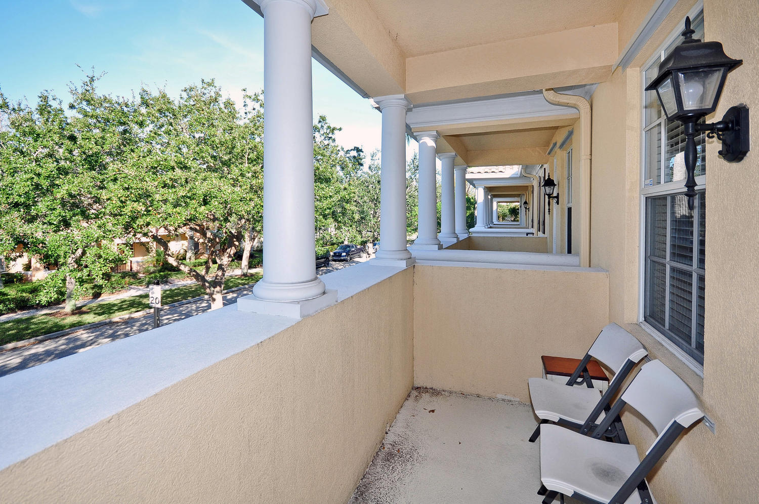 4135 Community Drive Jupiter, FL 33458 - Photo 20 of 39 a view of a room that has a bench and chair in it