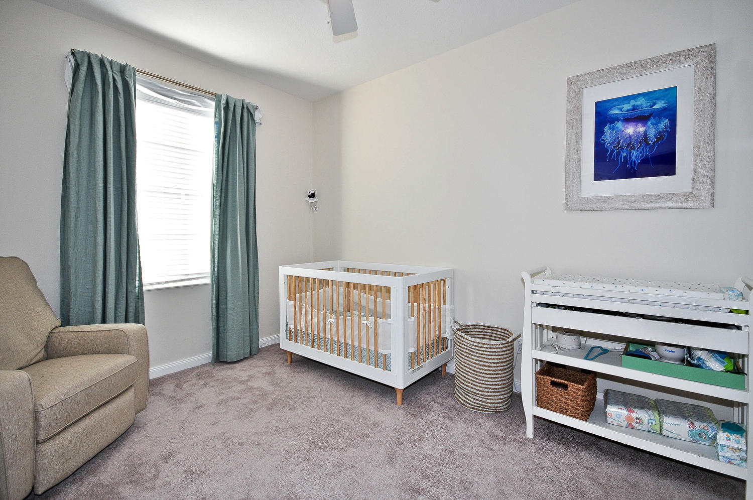 4135 Community Drive Jupiter, FL 33458 - Photo 29 of 39 a bedroom with furniture and a window