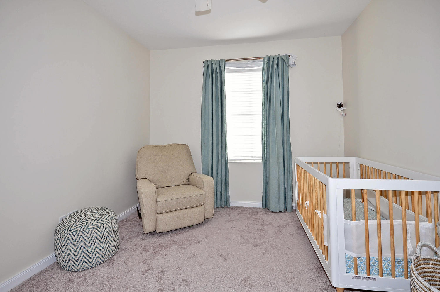 4135 Community Drive Jupiter, FL 33458 - Photo 30 of 39 a living room with furniture and a window