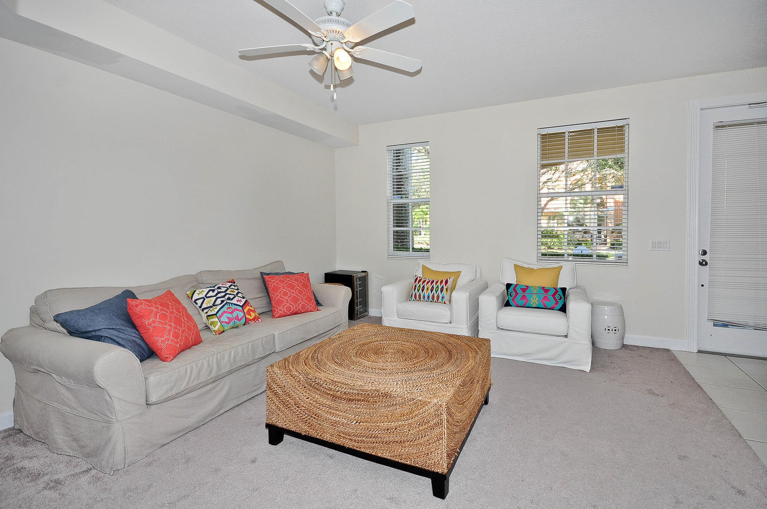 4135 Community Drive Jupiter, FL 33458 - Photo 3 of 39 a living room with furniture and a couch