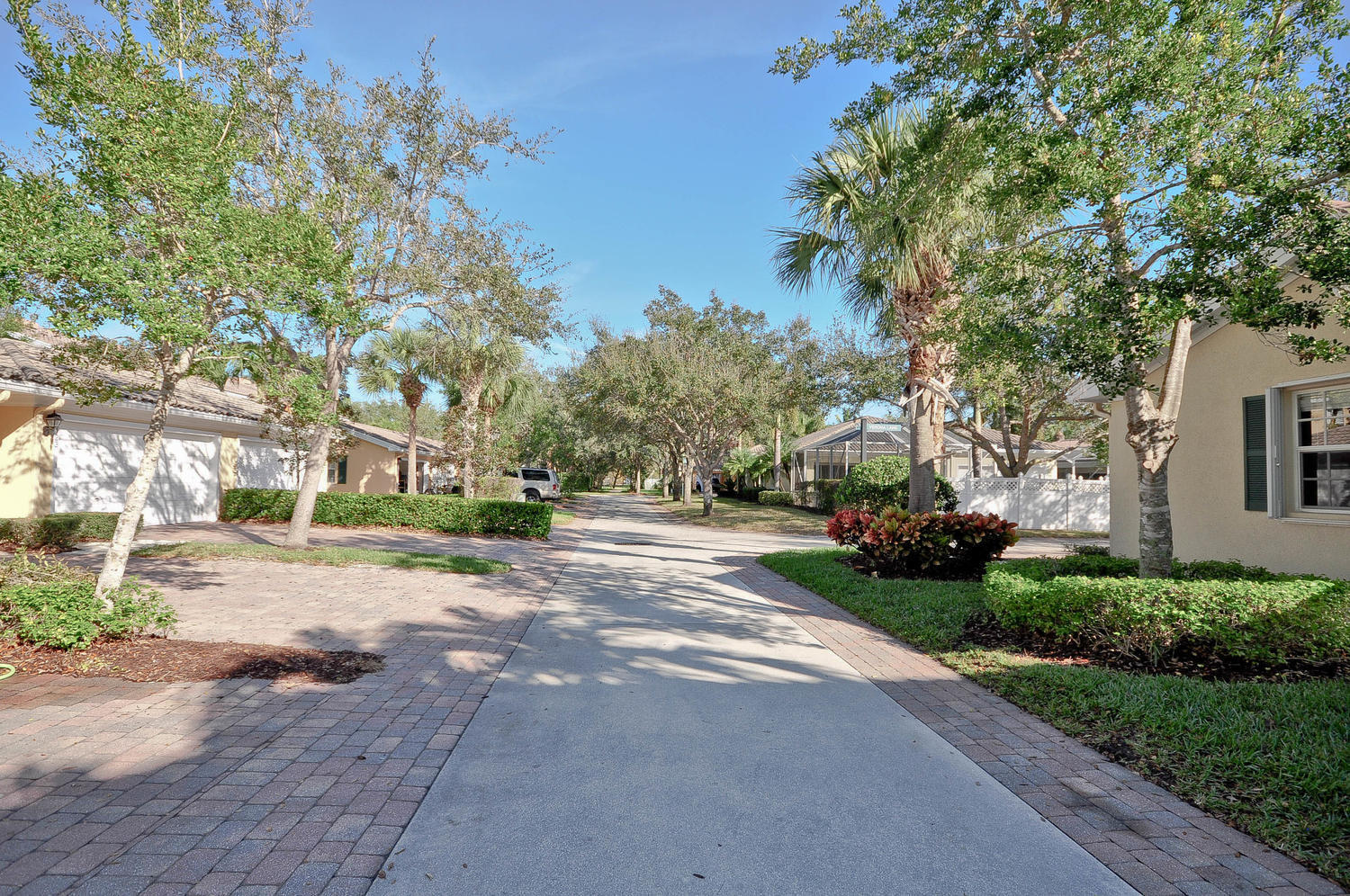 4135 Community Drive Jupiter, FL 33458 - Photo 33 of 39 a view of a street with a building in the background