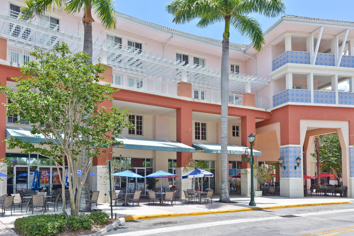 4135 Community Drive Jupiter, FL 33458 - Photo 37 of 39 a view of a building with a patio