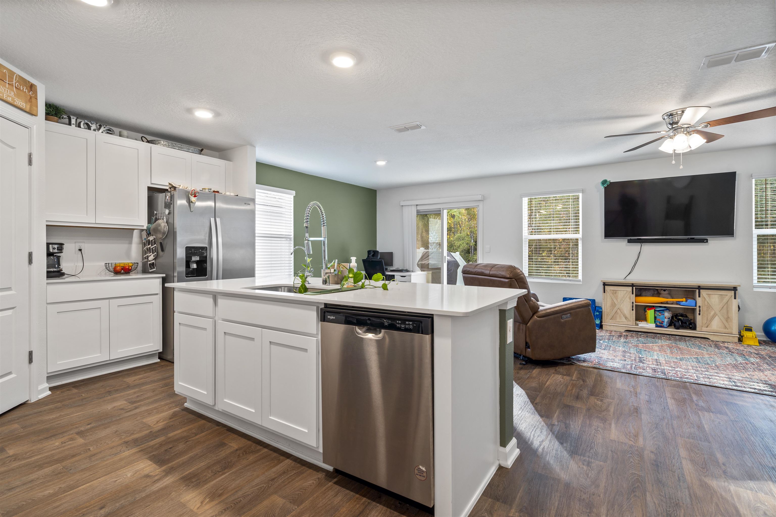 127 Encanto Way St. Augustine, FL 32084 - Photo 43 of 43 a kitchen with stainless steel appliances granite countertop a sink a stove and cabinets