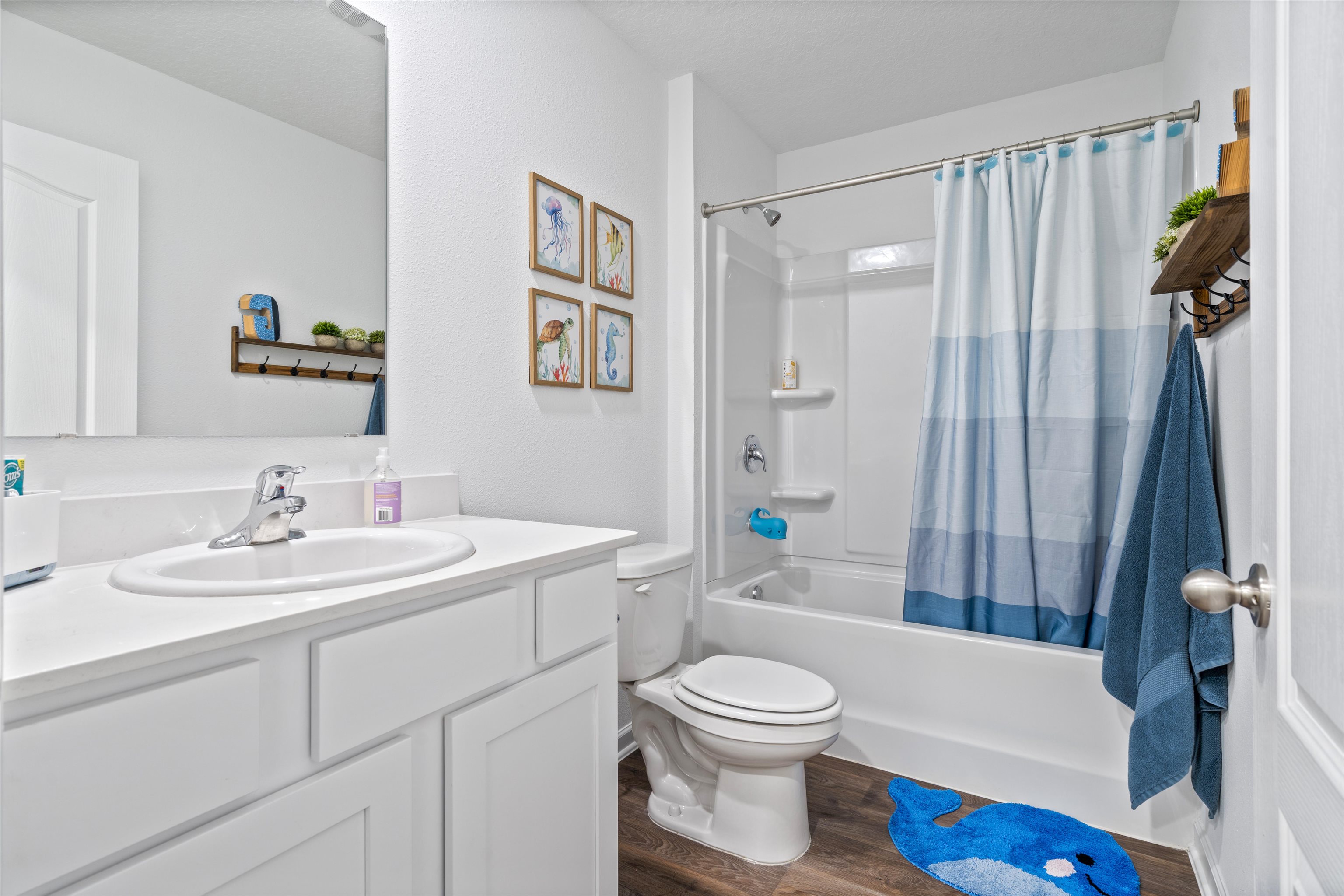 127 Encanto Way St. Augustine, FL 32084 - Photo 22 of 43 a bathroom with a toilet a sink and a bathtub