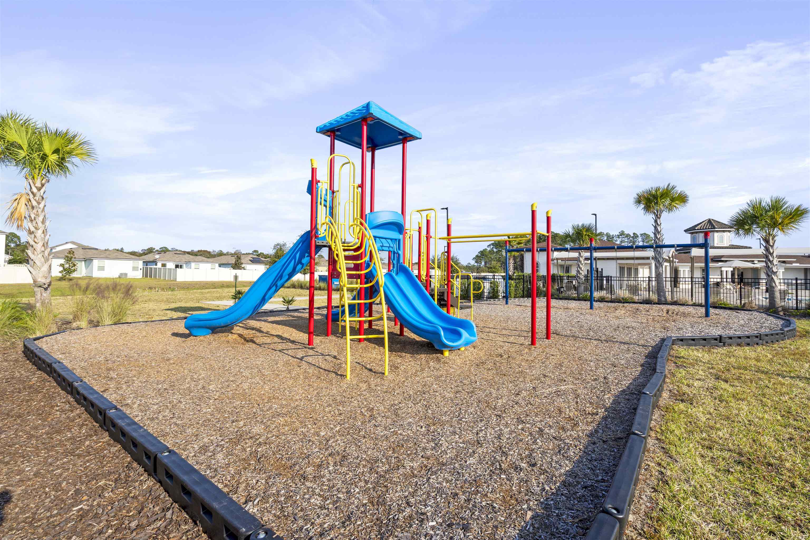 127 Encanto Way St. Augustine, FL 32084 - Photo 42 of 43 a view of a swimming pool with a deck and a lake view