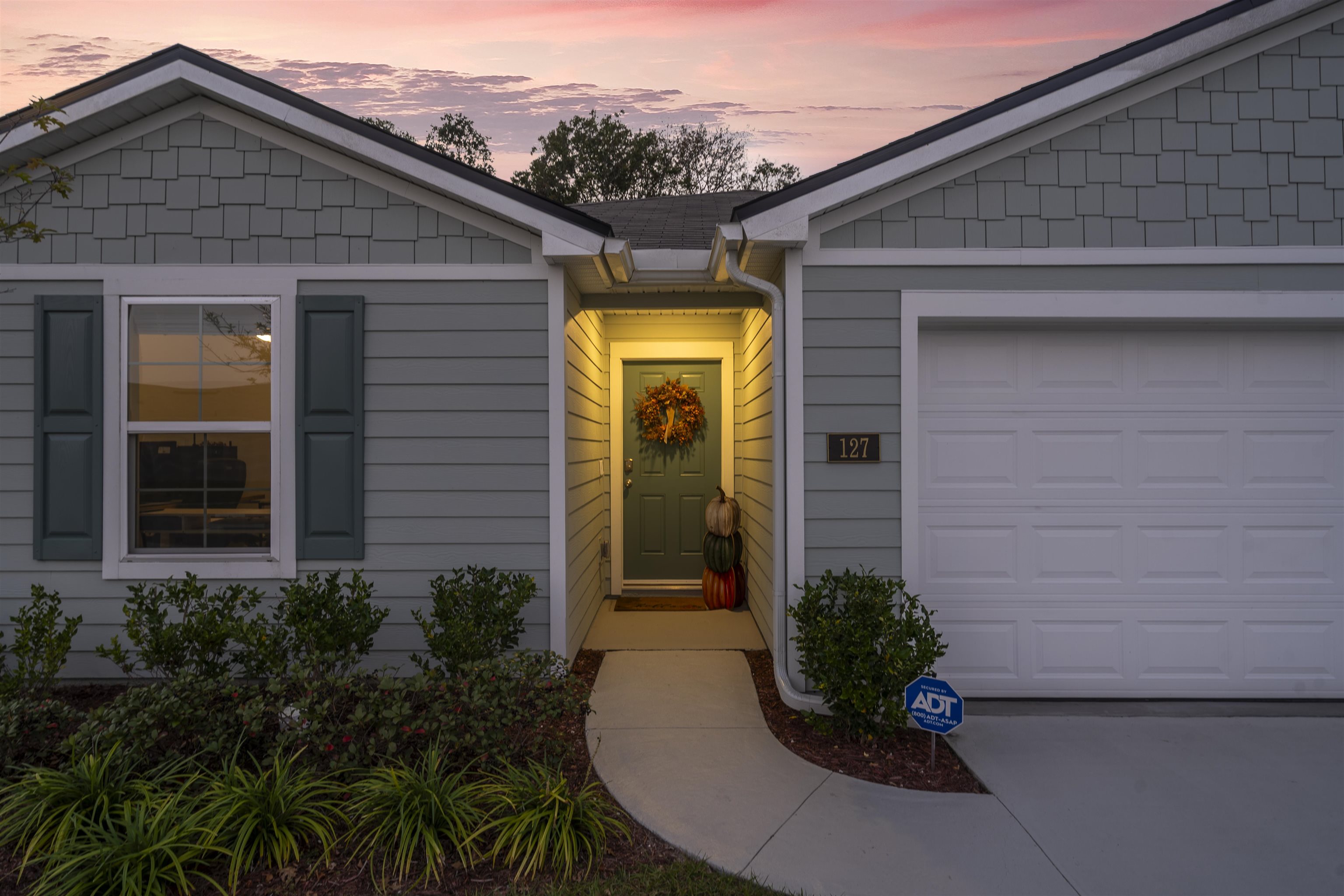 127 Encanto Way St. Augustine, FL 32084 - Photo 7 of 43 a view of a house with potted plants
