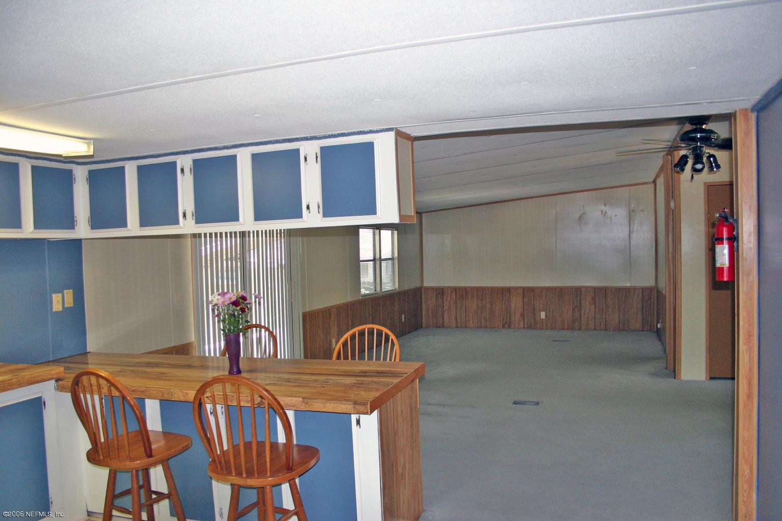 16231 Shark Road West Jacksonville, FL 32226 - Photo 10 of 10 a view of a dining room with furniture