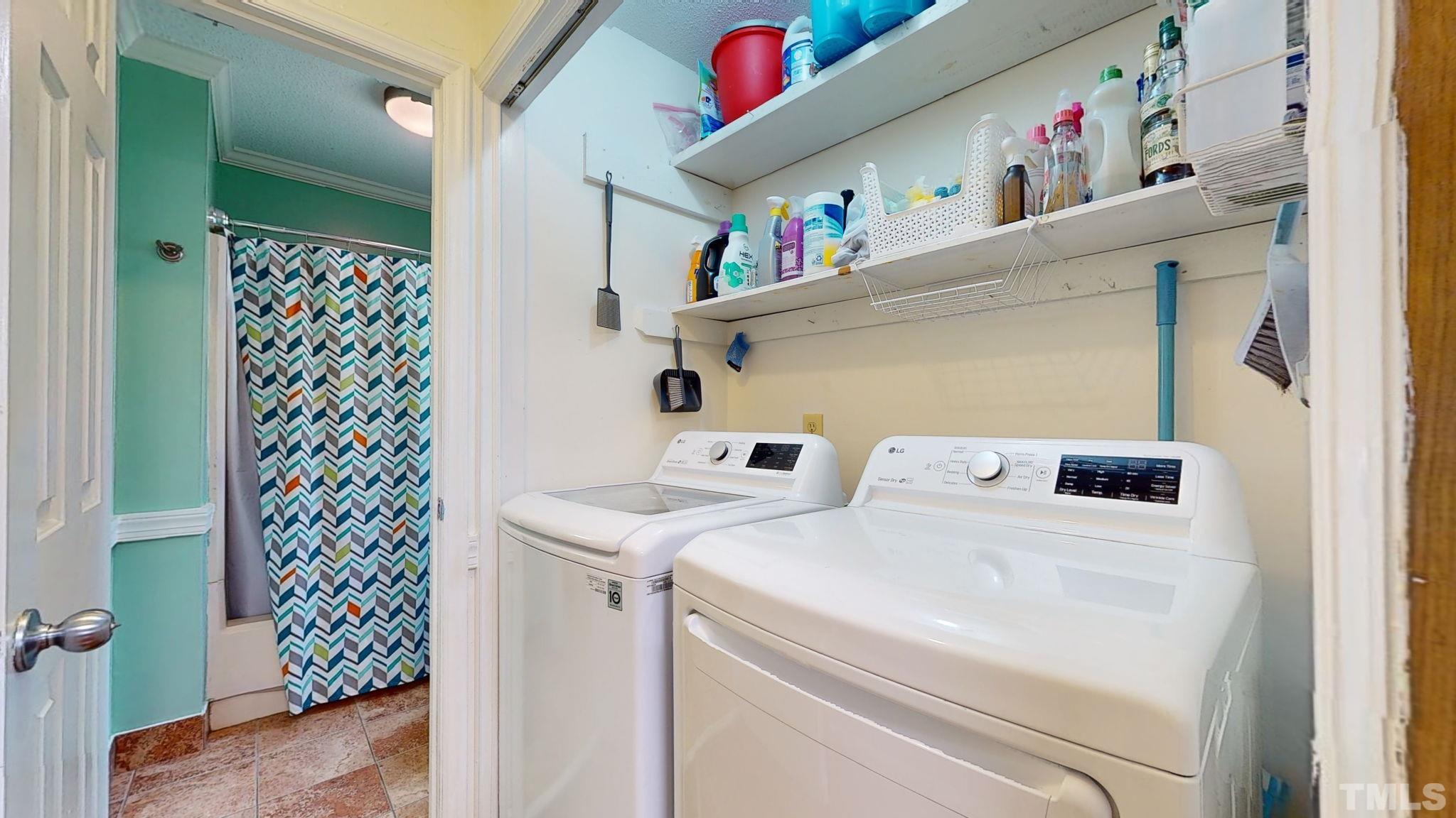 3308 Gatcombe Place Raleigh, NC 27604 - Photo 16 of 43 a utility room with dryer and washer