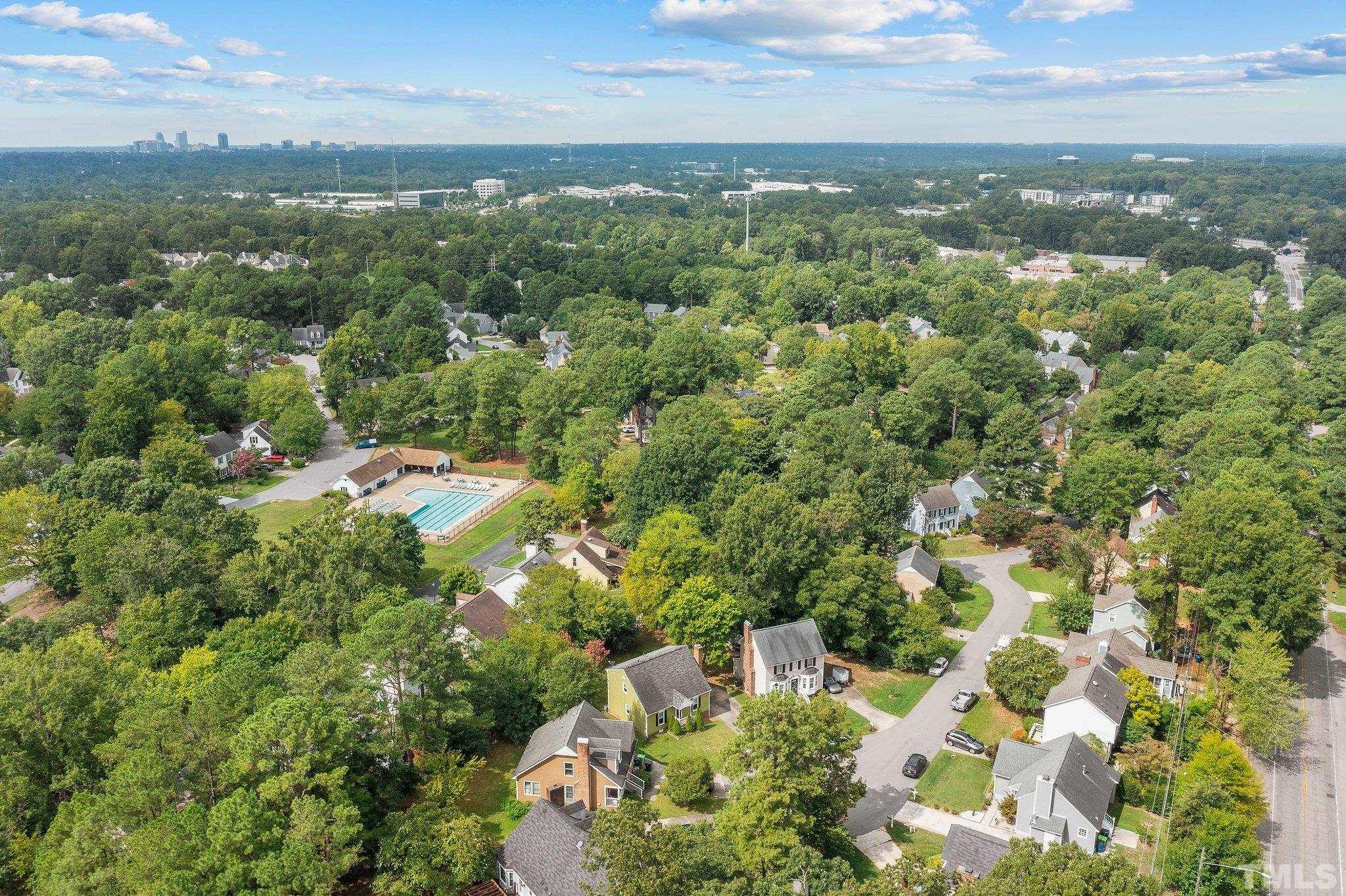 3308 Gatcombe Place Raleigh, NC 27604 - Photo 32 of 43 an aerial view of residential houses with outdoor space and trees