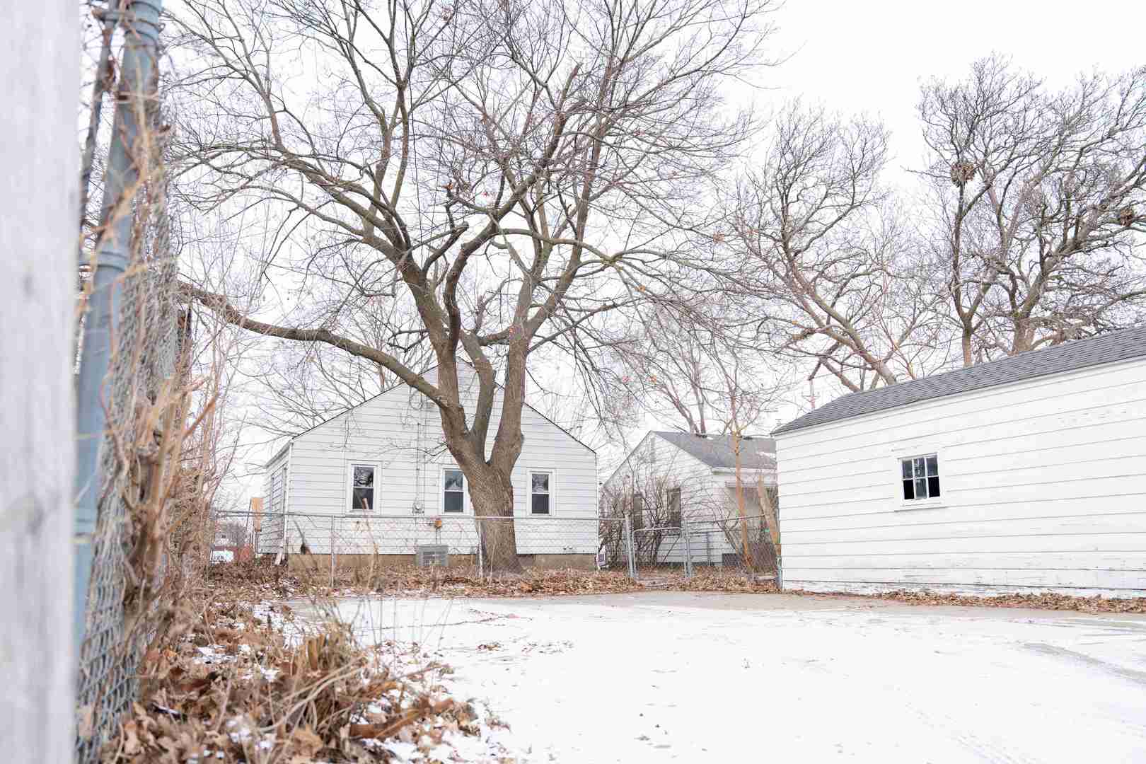 3105-9 9 1/2 Street Rock Island, IL 61201 - Photo 12 of 13 a view of a covered with snow in the yard