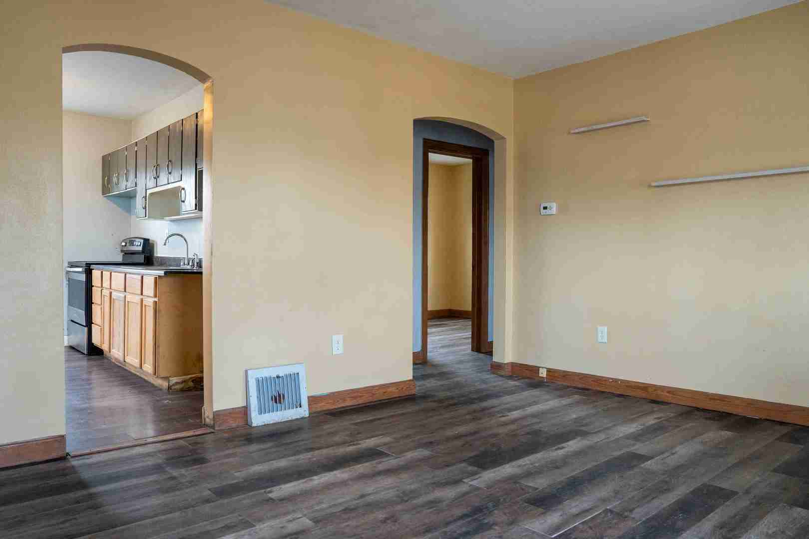 3105-9 9 1/2 Street Rock Island, IL 61201 - Photo 3 of 13 a view of empty room with wooden floor