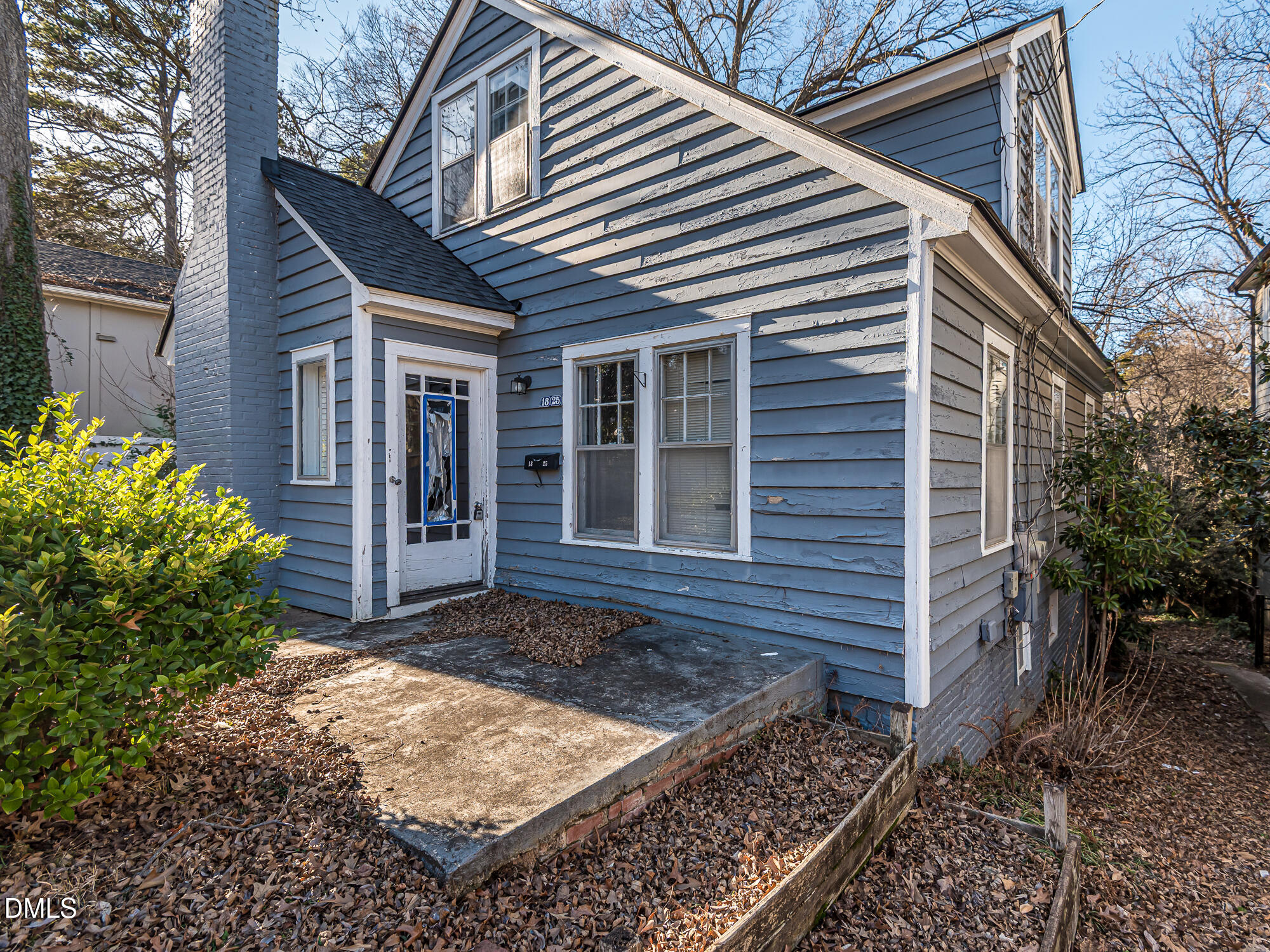 1825 White Oak Road Raleigh, NC 27608 - Photo 8 of 35 a front view of a house with garden