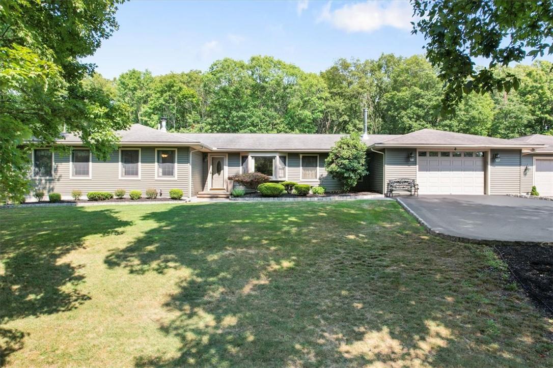 35 Arbor Road Campbell Hall, NY 10916 - Photo 1 of 1 Ranch-style home featuring a garage and a front lawn