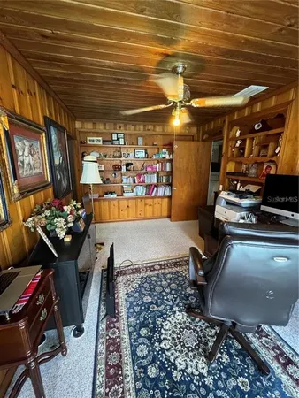 a room with lots of furniture and mountain view