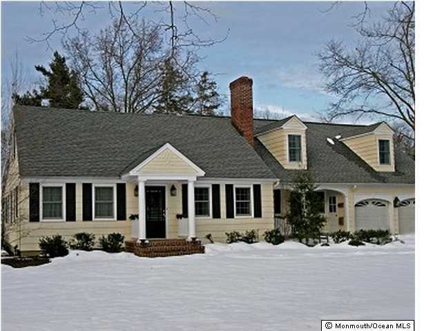 8 Blossom Road Rumson, NJ 07760 - Photo 1 of 3 a front view of a house with a yard