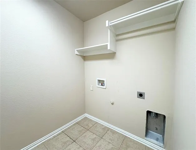 a view of small space with racks on the wall