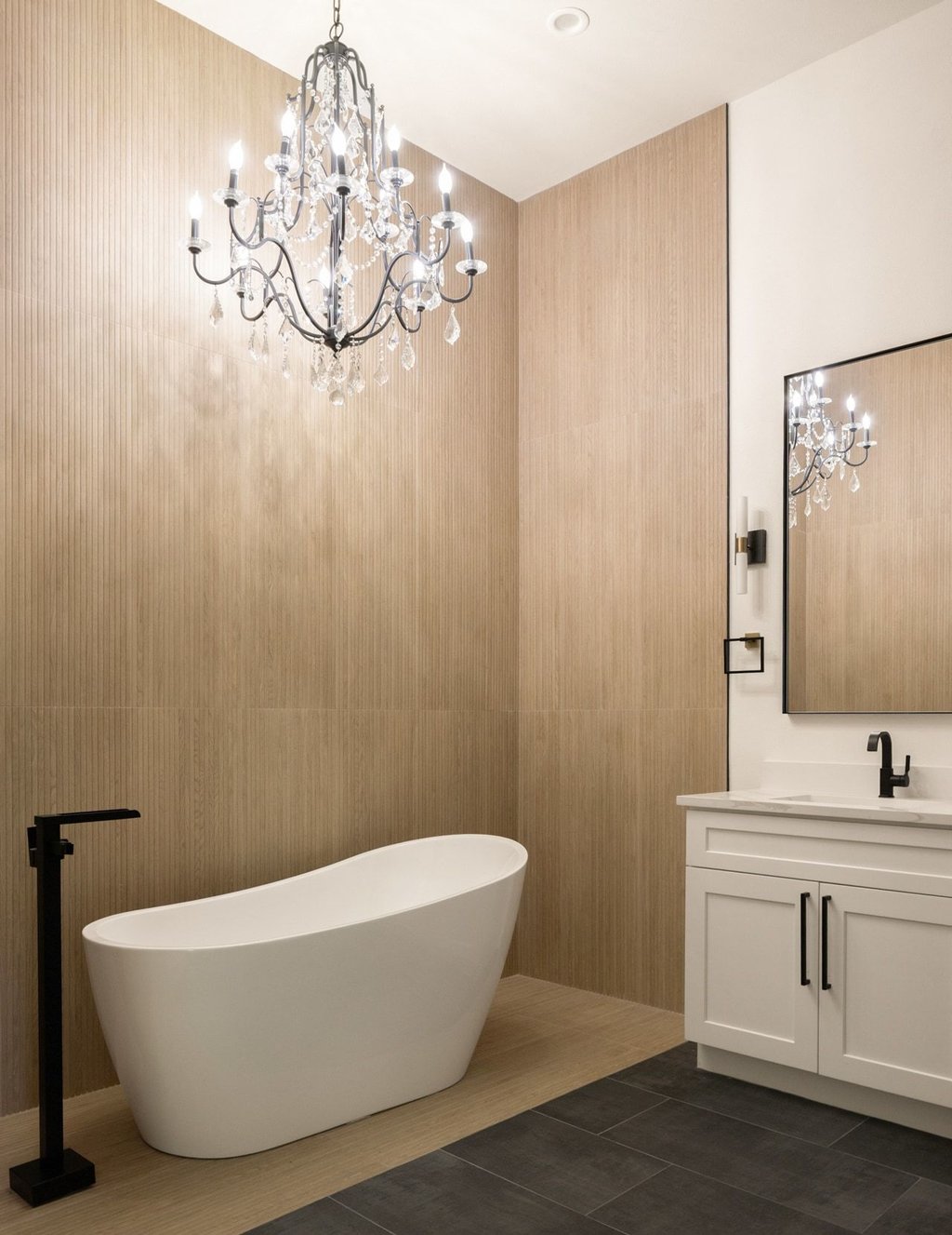 Undisclosed Address Austin, TX 78751 - Photo 11 of 20 The gorgeous free-standing soaking tub sits under a chandelier for the ultimate rejuvenation.