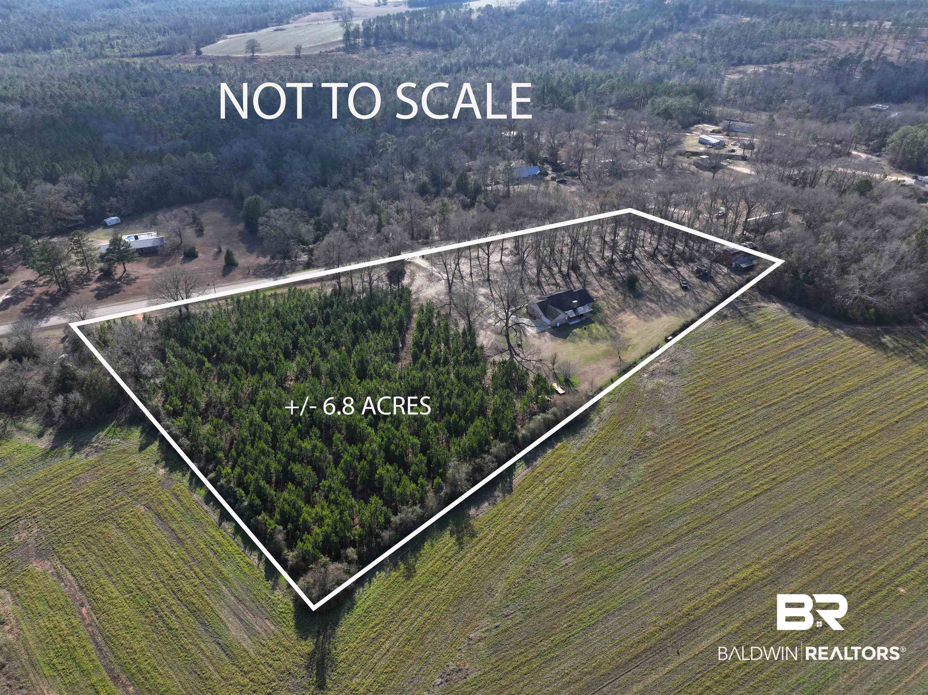 5646 Foshee Road Brewton, AL 36426 - Photo 2 of 37 Aerial overview of property's location featuring a heavily wooded area and property parcel outlined