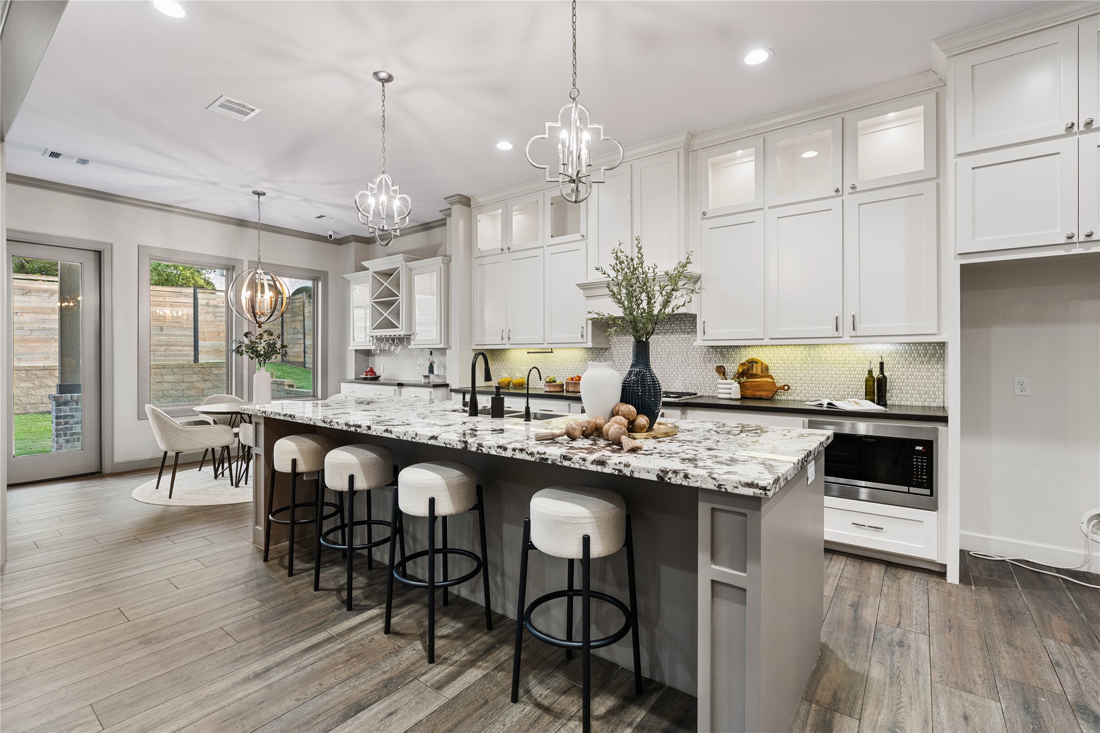 12379 Pebble View Drive Conroe, TX 77304 - Photo 12 of 46 Modern Kitchen Futures modern cabinetry with lights.