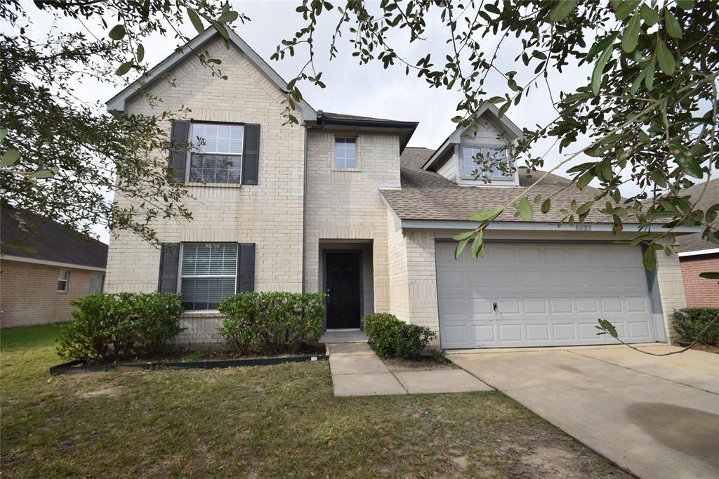 Enjoy a front view of this lovely home located at 8423 Windy Thicket.