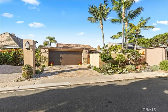 a view of a house with a street