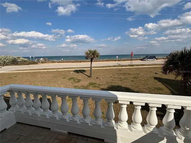 a spacious bathroom with a double vanity sink and a mirror