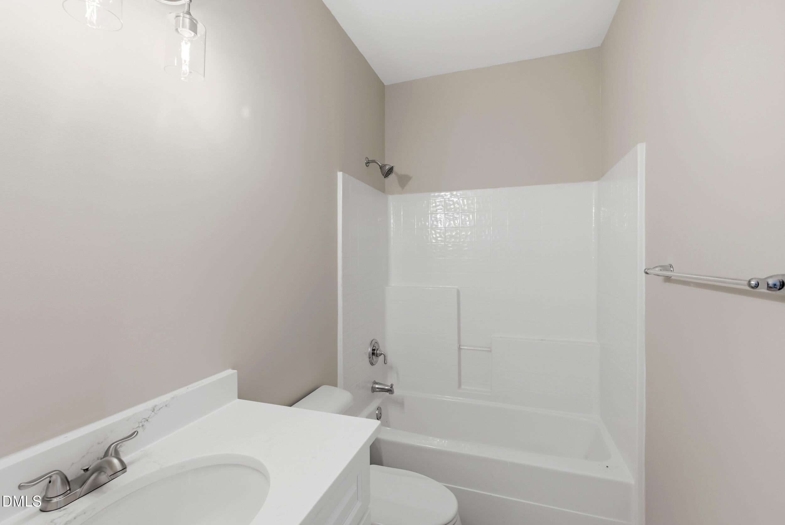 4803 Marena Place Durham, NC 27707 - Photo 23 of 42 a bathroom with a sink and a bathtub