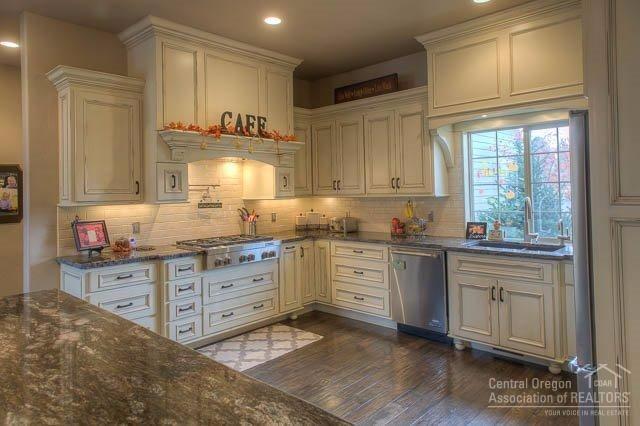60570 Woodside Road Bend, OR 97702 - Photo 7 of 23 The cabinets include many custom feature